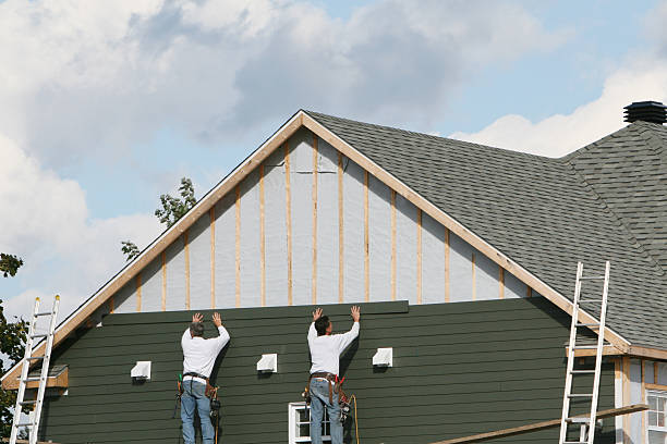Professional Siding technician working in Denton, NC